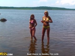 Students posing at the seaside and getting naughty